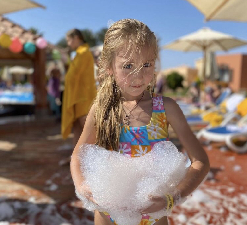 Girl enjoying foam party fun - Foam O Clock Party Rentals foam party rentals Boulder, CO